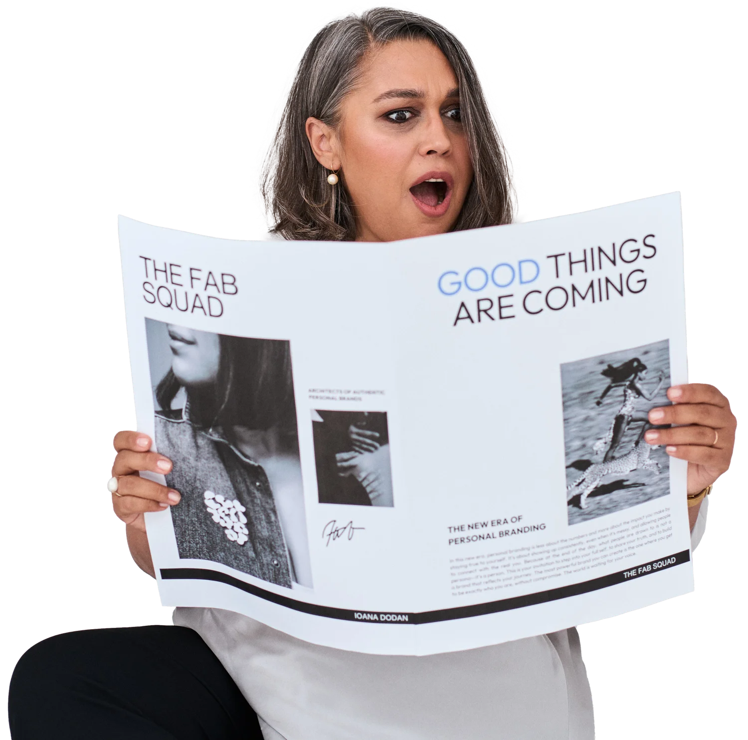Ioana reading The FAB Squad's Good Things Are Coming newspaper